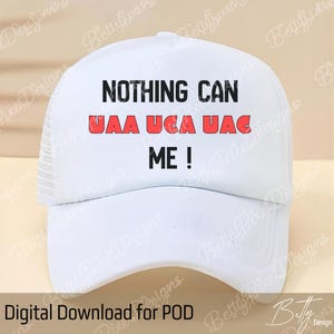 May include: White trucker hat with the text "NOTHING CAN UAA UCA UAC ME!" in black and red. The hat has a mesh back and a curved brim. The phrase is a play on words.