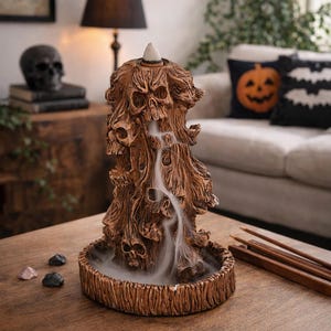 May include: A handmade wooden sign with the text "Welcome" in a whimsical font. The sign is painted white with a distressed finish, and features a decorative floral design in shades of pink and green. It measures approximately 12 inches wide.