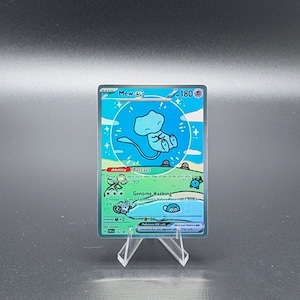 May include: A holographic Mew ex Pokémon trading card, displayed on a clear acrylic stand. The card features a blue Mew character within a blue circle, with the text "Mew ex" and "180" visible. The card also has the text "Restart" and "Genome Hacking".