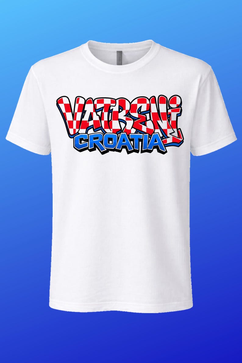 May include: White t-shirt with the text "VATRENI CROATIA" in a red, white, and blue design. The text is in a graffiti-style font. The shirt has short sleeves and a crew neck.