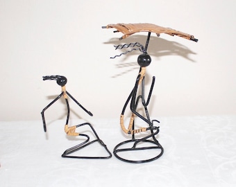 Black wire and rattan figures. Danish mid century design