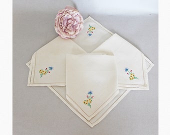 Set of four hand embroidered linen handkerchiefs