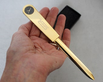 Vintage letter opener with clock