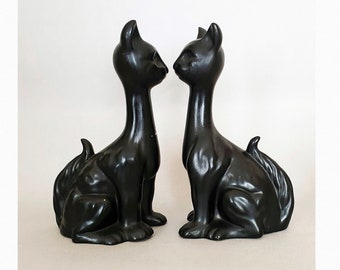 Vintage grotesque black pottery cats