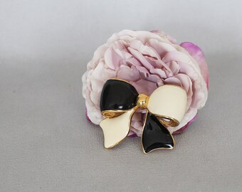 Joan Rivers statement bow brooch, black, cream and gold tone