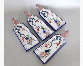 Vintage sushi plates, Arita porcelain battledore shape dishes and chopstick rests, signed