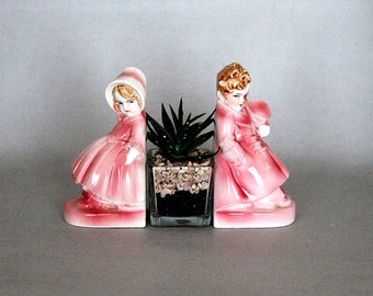 Boy and girl pink ceramic bookends. Hertwig bookends,flatbacks