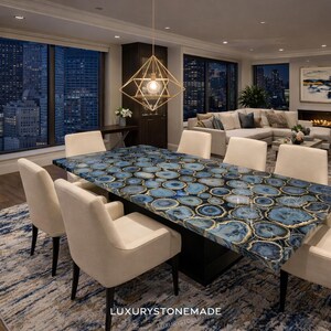 Handmade blue agate gemstone dining table slab featuring polished stone surface and dramatic crystal banding designed for luxury dining rooms, penthouses, and upscale homes across the USA. Natural agate mineral layers and vibrant blue gemstone textures create striking designer dining table centerpiece for modern interior decor.
