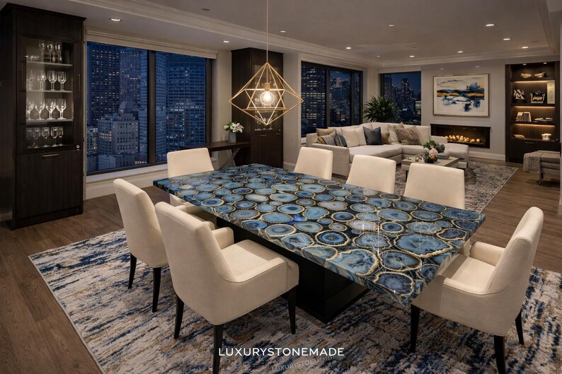 Handmade blue agate gemstone dining table slab featuring polished stone surface and dramatic crystal banding designed for luxury dining rooms, penthouses, and upscale homes across the USA. Natural agate mineral layers and vibrant blue gemstone textures create striking designer dining table centerpiece for modern interior decor.