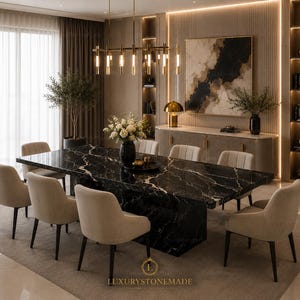 May include: A rectangular dining table with a black marble top featuring white veining, supported by a solid base. The table is surrounded by eight upholstered beige chairs with dark legs. The text LUXURYSTONEMADE is visible at the bottom centre.