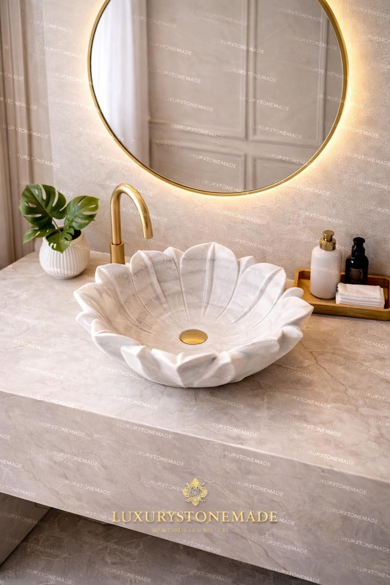 Modern luxury marble lotus sink made from natural white marble featuring floral sculptural design and refined polished surface perfect for statement bathroom decor upscale homes and high end interior design projects adding elegance and visual interest