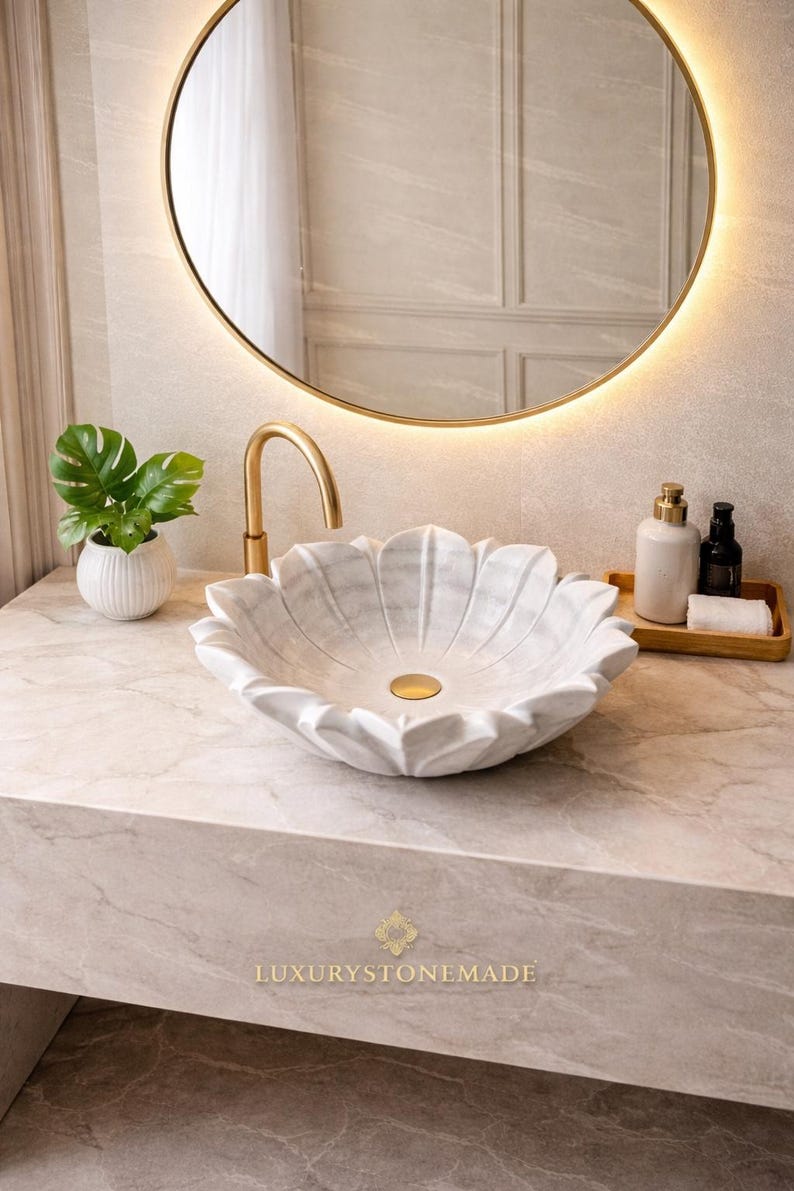 Designer marble lotus basin with floral carved structure featuring polished finish and natural stone patterns perfect for modern bathrooms spa spaces and high end decor projects offering durability elegance and artistic craftsmanship