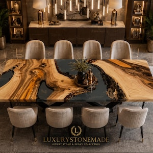 May include: A large, rectangular dining table with a unique wood grain design and a dark epoxy resin center. The table is surrounded by eight beige upholstered chairs. The table is approximately 100 inches long.