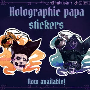 May include: Two stickers featuring a character wearing a tall black hat and a chain with a spiked ball. One sticker has orange smoke accents, while the other has blue smoke accents and a purple star symbol. Text reads Holographic papa stickers.
