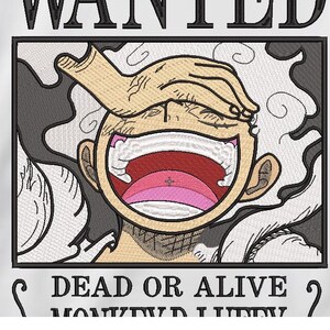 May include: Embroidered patch featuring a cartoon character with a wide open mouth, covered by a hand. The text "WANTED" is at the top, and "DEAD OR ALIVE" is at the bottom. The character's mouth is pink and red.