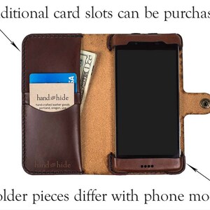 May include: A brown leather phone case with a slot for a credit card and cash. The case has a flap that covers the phone screen and a snap closure. The text "hand hide" is printed on the case. Additional card slots can be purchased.