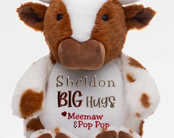 Peluche personalizado: nombres y fecha bordados.