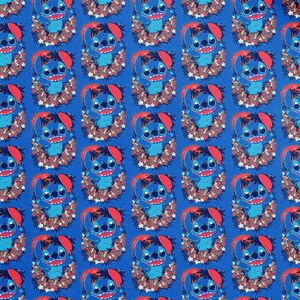 May include: A repeating pattern of the character Stitch from the animated film Lilo & Stitch. The blue alien is surrounded by a floral wreath on a blue background. The pattern is suitable for fabric or wallpaper.