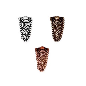 May include: Three pendant bails with a swirl design. The bails are silver, gold, and copper.