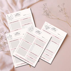 May include: A collection of white and pink ADHD Mum Weekly Reset planner sheets are displayed. Each sheet includes sections for appointments, meals, and reminders, with the text "Mental Load Brain Dump" and "Kids Admin". The sheets are decorated with line art illustrations.