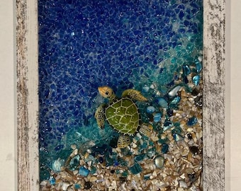 Crushed glass and resin artwork with sea turtle embellishment