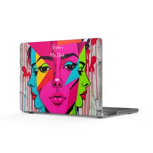 May include: A laptop skin featuring a vibrant pop art illustration of three faces in profile and front view, colored in bright pink, yellow, blue, and green. The design includes graffiti-style paint drips and the text Sylvia's MacBook.