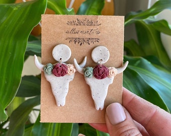 Cow Skull Clay Earrings | Statement earrings, chic, boho, cowgirl, ranching, animal, bovine, cow, livestock, hippie, floral, flower