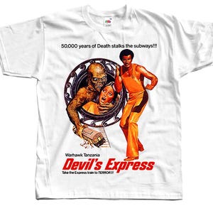 May include: A white short-sleeve t-shirt featuring a graphic print from the film Devil's Express. The design includes a monster, a person, and a subway train with the text: 50,000 years of Death stalks the subways!!! Warhawk Tanzania Devil's Express.