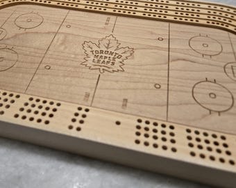 Descarga digital del tablero de cribbage con temática de hockey de 4 pistas