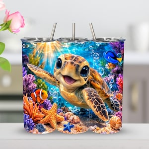 May include: Three stainless steel tumblers with a wraparound design featuring a cartoon sea turtle swimming in a vibrant underwater scene. The design includes colorful coral, fish, and bubbles.