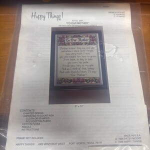May include: A Happy Things cross stitch kit titled To Our Mother, kit number 8064. The package includes a charted design, 14-count Aida cloth, cotton floss, a needle, and instructions for an 8 inch by 10 inch project. The design features floral borders.