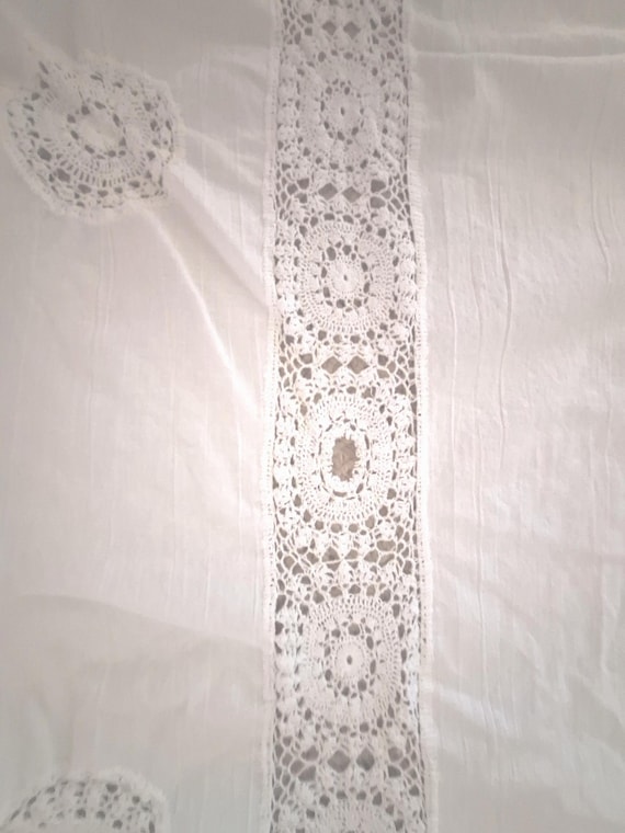 White cotton rectangle tablecloth, 84X 54 inches.
