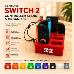 May include: A red 3D-printed Switch 2 controller stand and organiser. The stand has multiple slots for organisation and features the text "SWITCH 2". The image also shows a variety of custom colour options for the stand.