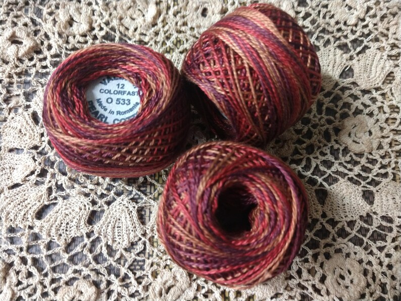 Burgundy to gold Valdani Perle Cotton Size 12 0533 Golden Autumn color Golden reds
