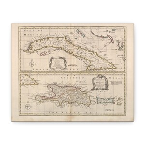 May include: Antique map print featuring detailed cartography of the Caribbean islands, including Cuba and Hispaniola. The map is printed on aged paper with intricate line work, compass roses, and text labels. The map is framed in a light wood.