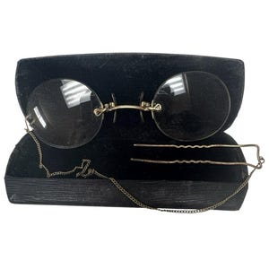 May include: A set of three ceramic mugs with a speckled, matte finish. The mugs are in shades of cream, light gray, and dark gray. Each mug has a simple, minimalist design, perfect for coffee or tea.