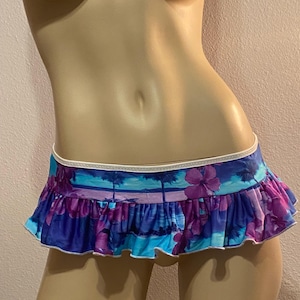 May include: A rustic wooden sign with the text "Welcome to our home" in white lettering. The sign features a distressed finish and a simple, inviting design, perfect for entryway decor.