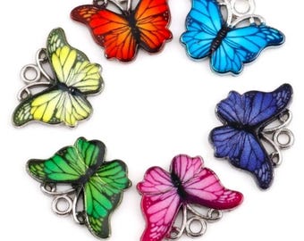 Butterfly charms, enamel butterflies in assorted colors, black patterned with silver backs , pick color