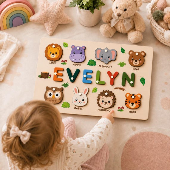 A child's name spelled out as a custom wooden animal puzzle — each letter is a unique animal shape, making it a learning toy and a keepsake in one.