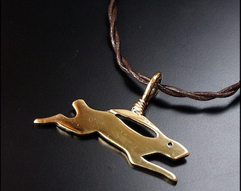 The hare runs into the fire... - brass necklace