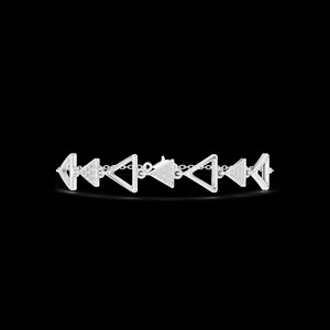 May include: A silver bracelet featuring a series of open triangle shapes connected by small chain links. The triangles alternate between smooth and textured surfaces, creating a geometric pattern. The bracelet is set against a black background.