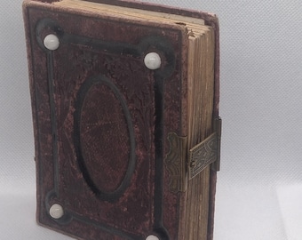 Antique tuntype photos in vintage 19th century leather album