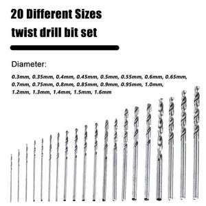 Könnte beinhalten: Ein Set aus 20 silberfarbenen Spiralbohrern aus Metall, angeordnet in aufsteigender Größe. Der Text lautet 20 Different Sizes twist drill bit set und listet Durchmesser von 0,3 mm bis 1,6 mm auf. Jeder Bohrer hat ein spiralförmiges Design.