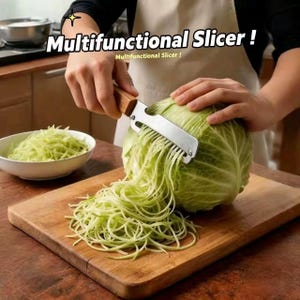 May include: A stainless steel vegetable slicer with a wooden handle being used to shred a head of green cabbage into thin strips on a wooden cutting board. The text "Multifunctional Slicer !" is visible at the top of the image.