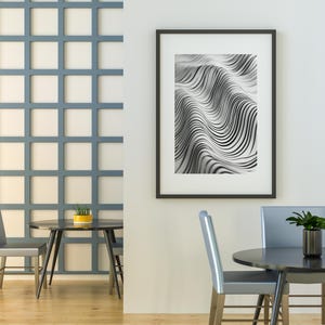 May include: A modern interior scene featuring a framed black and white abstract art print. The room includes a table, chairs, and decorative plants. The wall has a grid pattern in a light blue color.