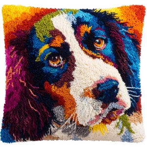 May include: Square decorative pillow featuring a colorful, textured image of a dog's face. The dog's fur is depicted in a variety of colors, including blue, orange, yellow, and white. The pillow has a soft, plush appearance.