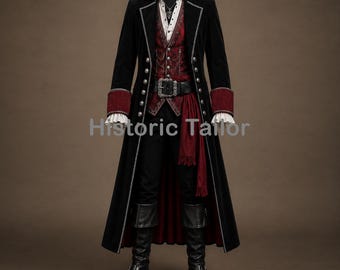 May include: A long black coat with silver buttons and red cuffs, worn over a red patterned vest, white collared shirt, black trousers, and black boots. A black belt with a silver buckle and a red sash are worn at the waist. The text Historic Tailor is visible.