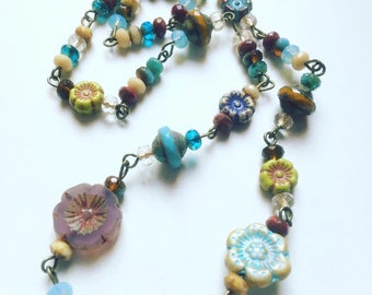 Short, feature necklace, glass beads, mix colour, boho, hippie, flowers, pansy, blue, red, Saturn beads, by TinkerDee2 on etsy