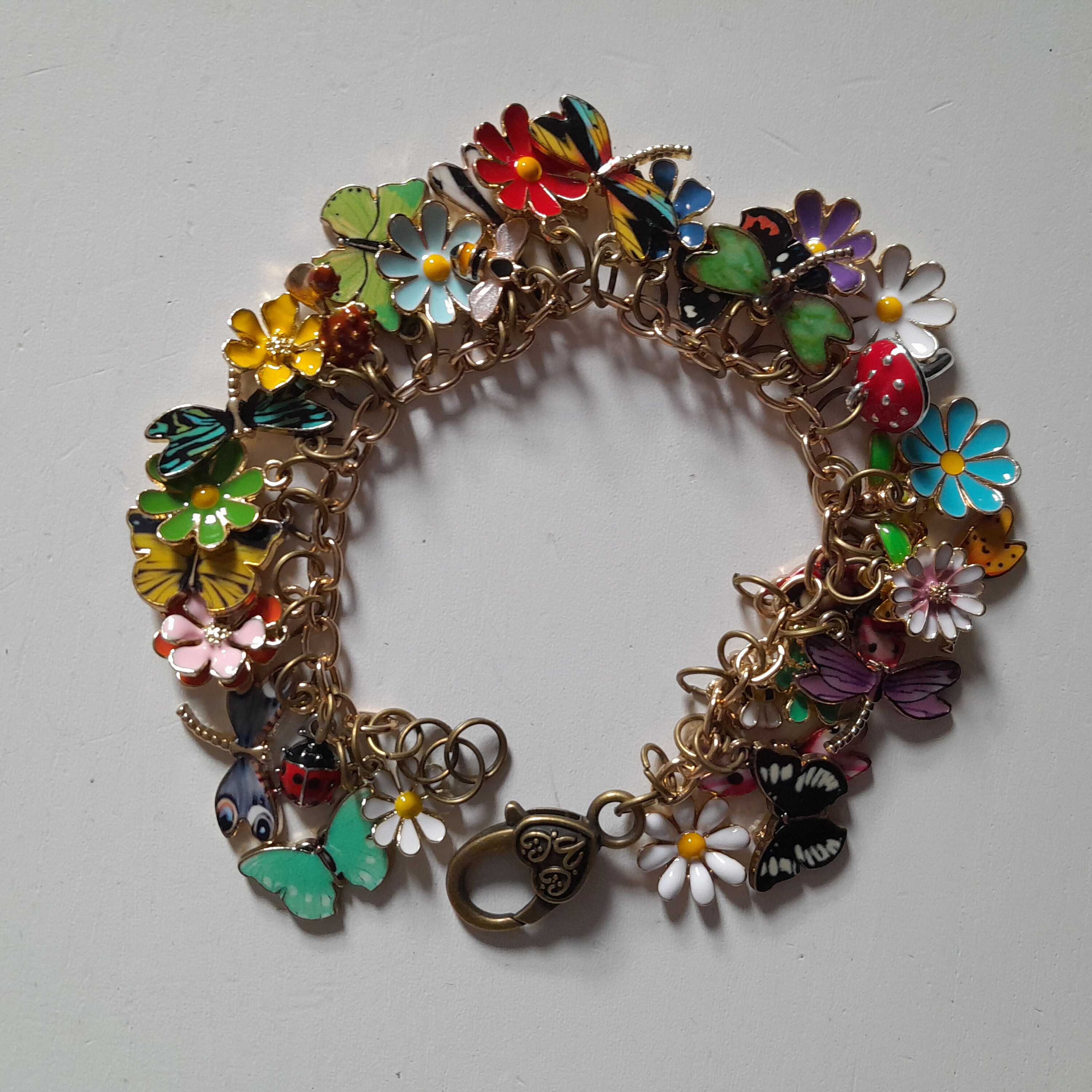 A Sweet Floral Charms Bracelet Flowers Daisies Enamel Flowers