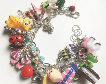 Children's charms bracelet, Fully loaded, Mix colours, mix theme, fantasy, charms bracelet, ladybird, horse, bee, by TinkerDee2  on etsy